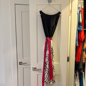 Stylish Black and White Dress with Pink Accent Sash